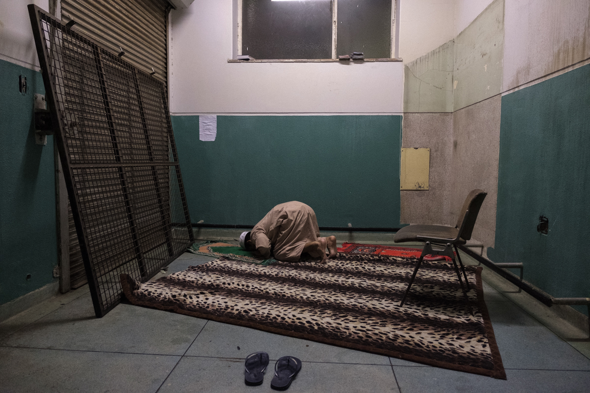 Man prays in section of former hospital repurposed for Islamic prayers